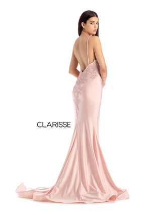 Clarisse 8207 is a long fitted prom dress with a deep v neck bodice embellished with lace appliques, and an open lace up back, made in silky stretch knit fabric with a dramatic long train. Shown in Blush